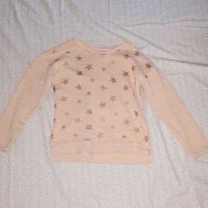 PEEK pink sweatshirt with rose gold stars.